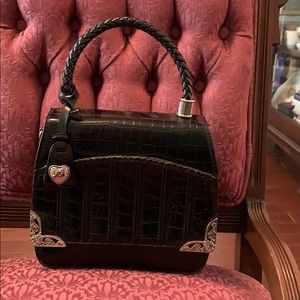 Black leather handbag with silver trim